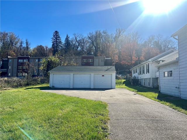 garage with a lawn