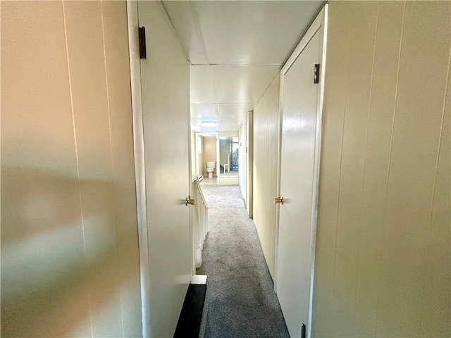 hallway with carpet flooring