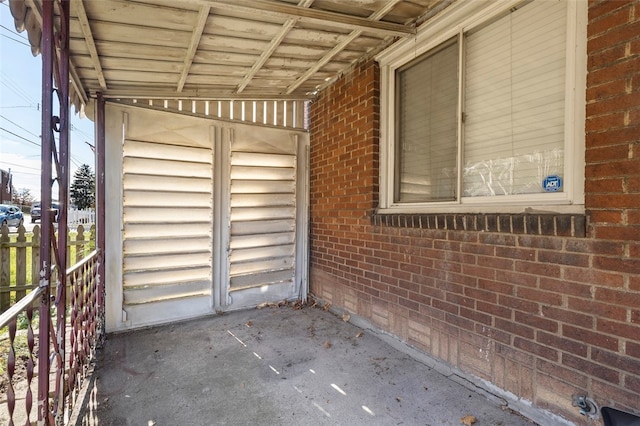 exterior space with vaulted ceiling