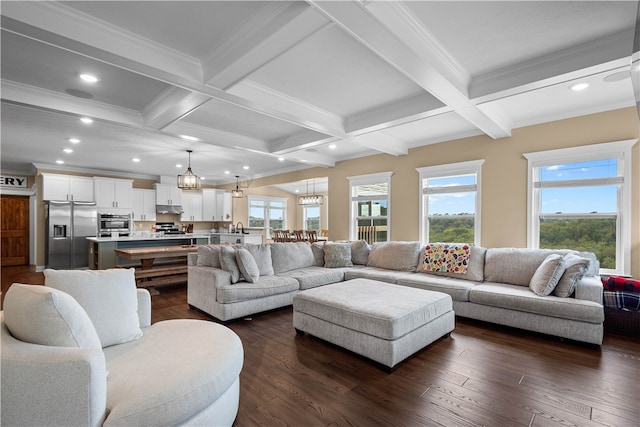 living room featuring beam ceiling, dark hardwood / wood-style flooring, and coffered ceiling