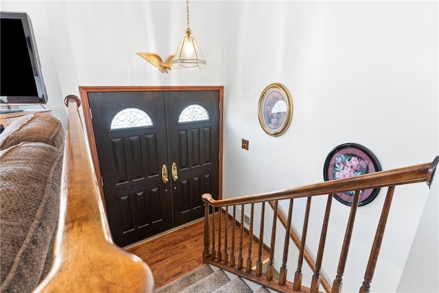 foyer entrance with hardwood / wood-style floors