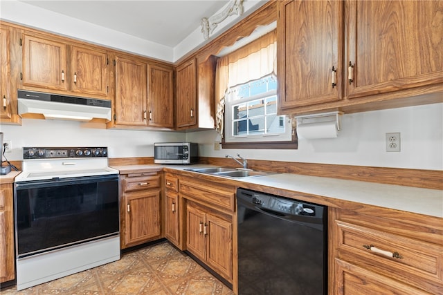 kitchen with dishwasher, sink, and electric range