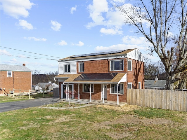 front of property featuring solar panels