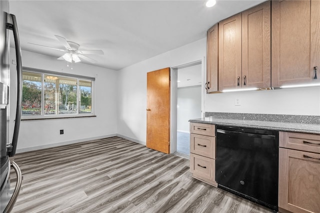 kitchen with hardwood / wood-style flooring, ceiling fan, black dishwasher, and light brown cabinetry