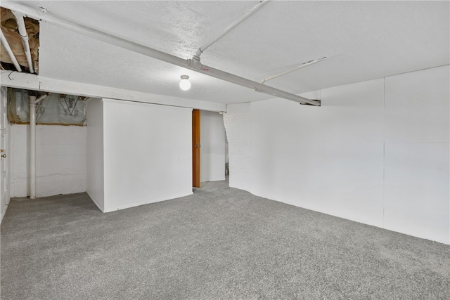 basement with carpet flooring