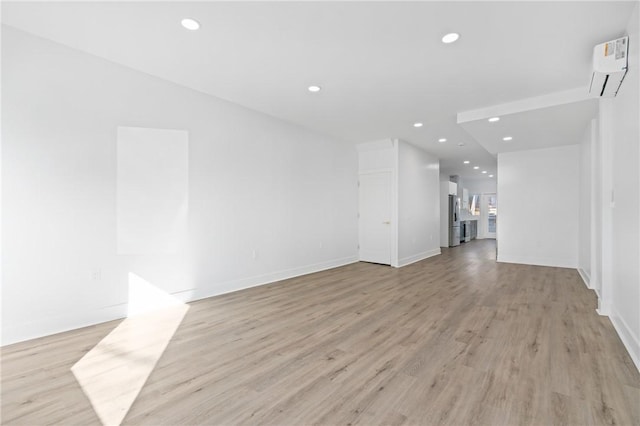 unfurnished living room featuring light hardwood / wood-style flooring