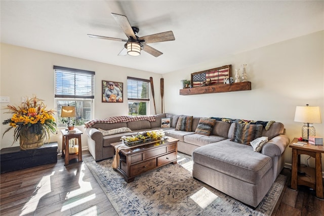 living room featuring hardwood / wood-style floors and ceiling fan