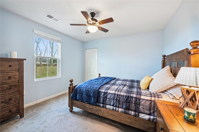 carpeted bedroom with ceiling fan