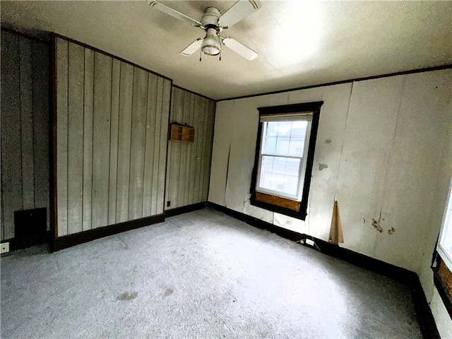 spare room featuring ceiling fan