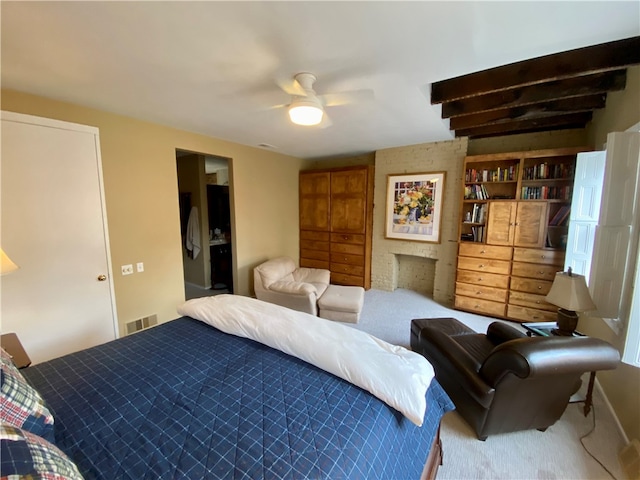 carpeted bedroom with ceiling fan and visible vents