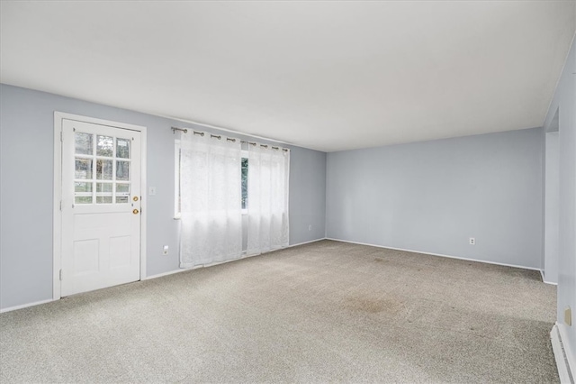 empty room featuring carpet flooring