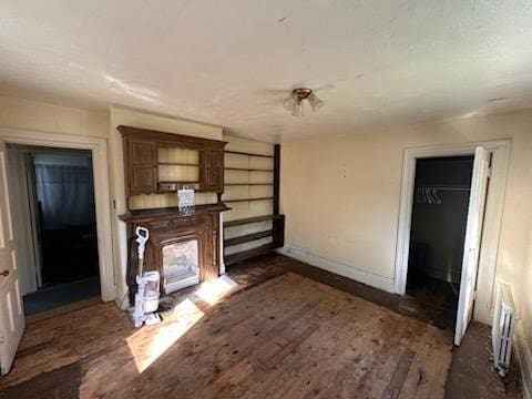 living room featuring dark hardwood / wood-style flooring