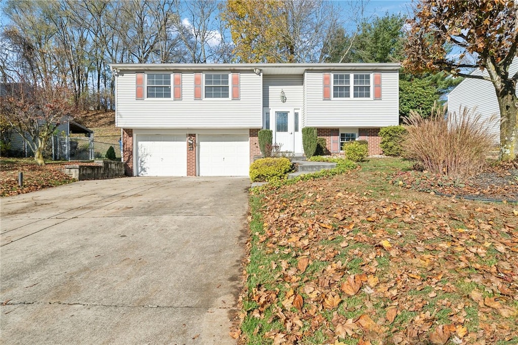 bi-level home featuring a garage