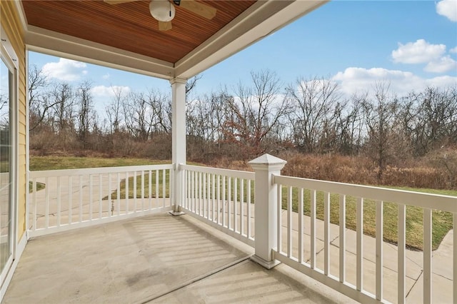 exterior space featuring ceiling fan