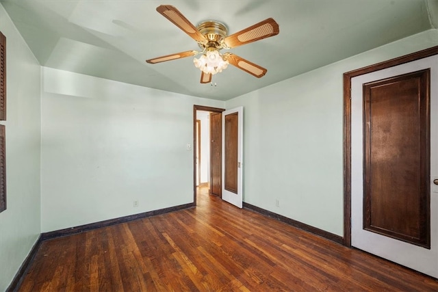 unfurnished bedroom with dark wood-type flooring and ceiling fan