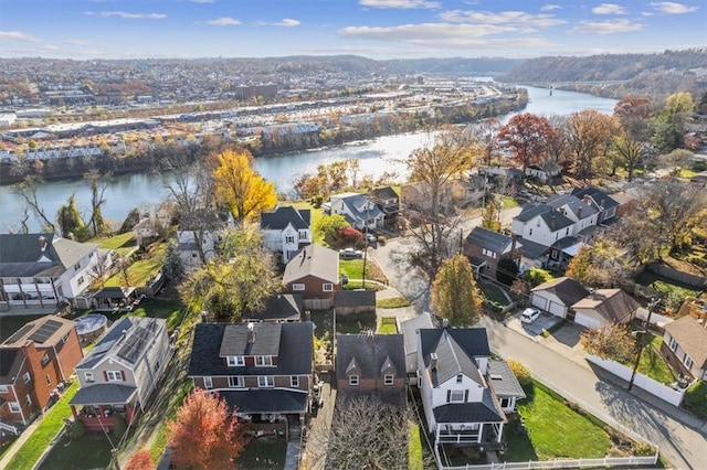 drone / aerial view with a water view