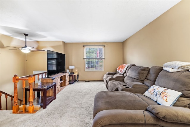 living room with ceiling fan and carpet floors