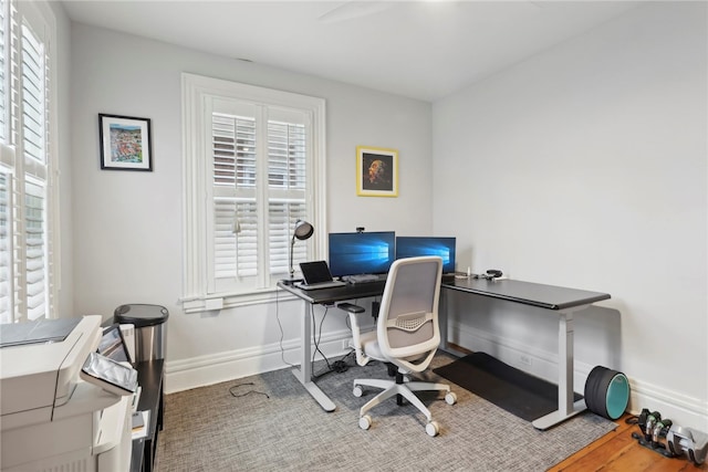 home office featuring hardwood / wood-style floors