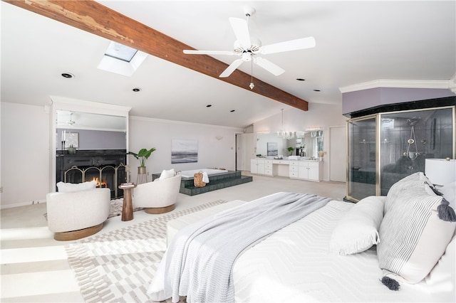 bedroom with ceiling fan, vaulted ceiling with skylight, light carpet, and ornamental molding