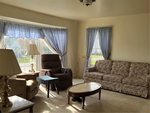 living room with light carpet and a wealth of natural light