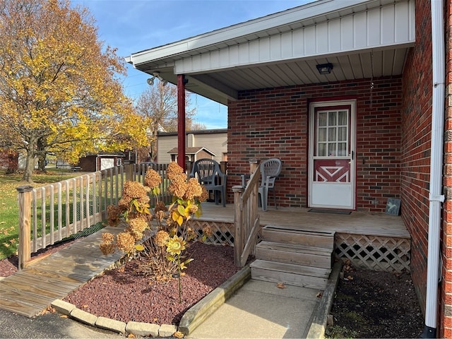 doorway to property with a porch