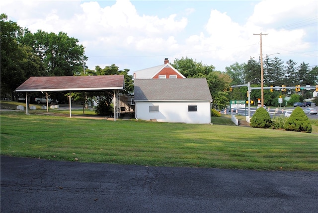 exterior space with a yard