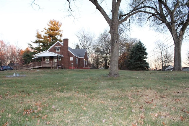 view of yard with a deck