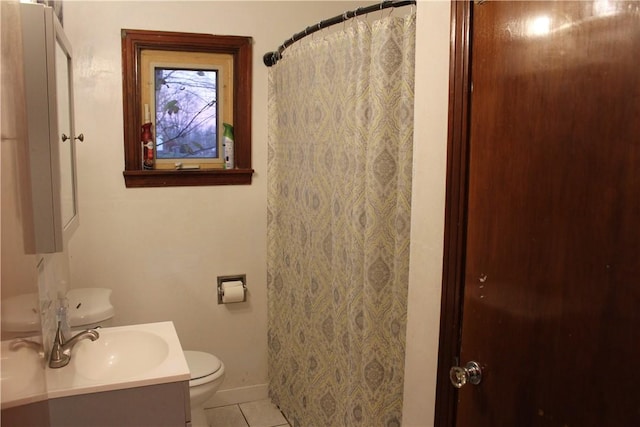 bathroom featuring walk in shower, tile patterned flooring, vanity, and toilet