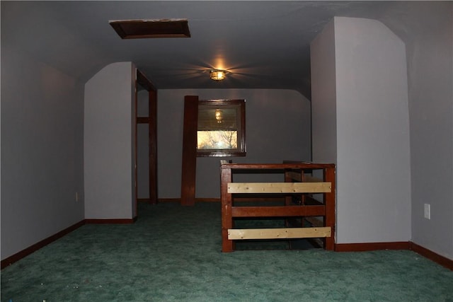 additional living space with lofted ceiling and carpet floors