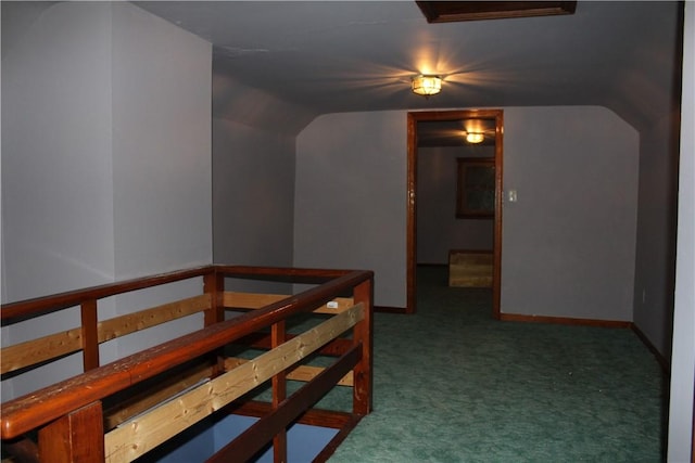 additional living space with carpet and lofted ceiling