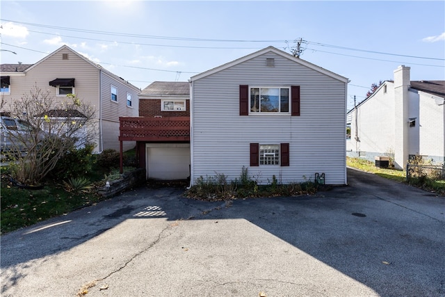 exterior space with a garage