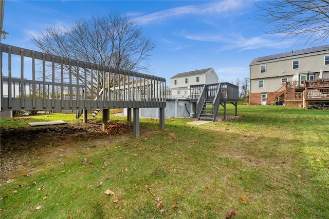 view of yard featuring a wooden deck