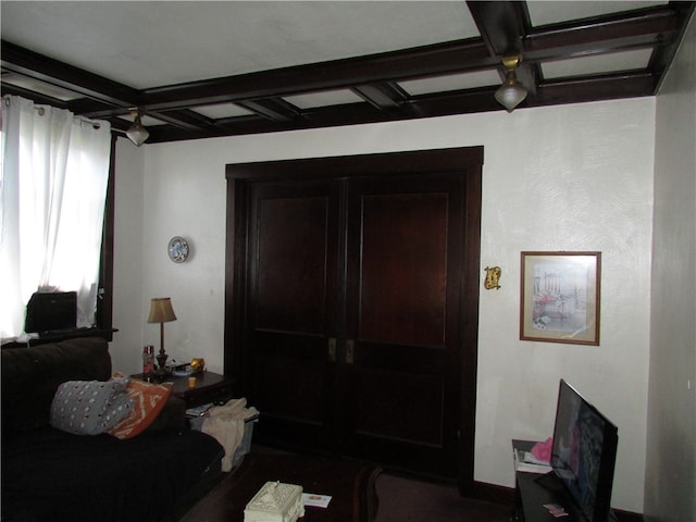 interior space featuring beam ceiling and coffered ceiling