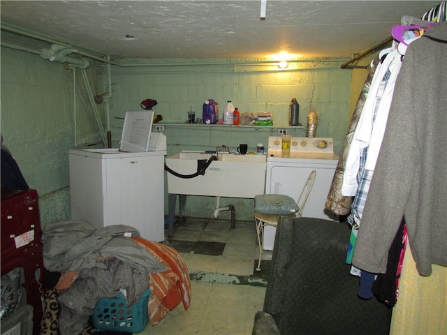 washroom with separate washer and dryer