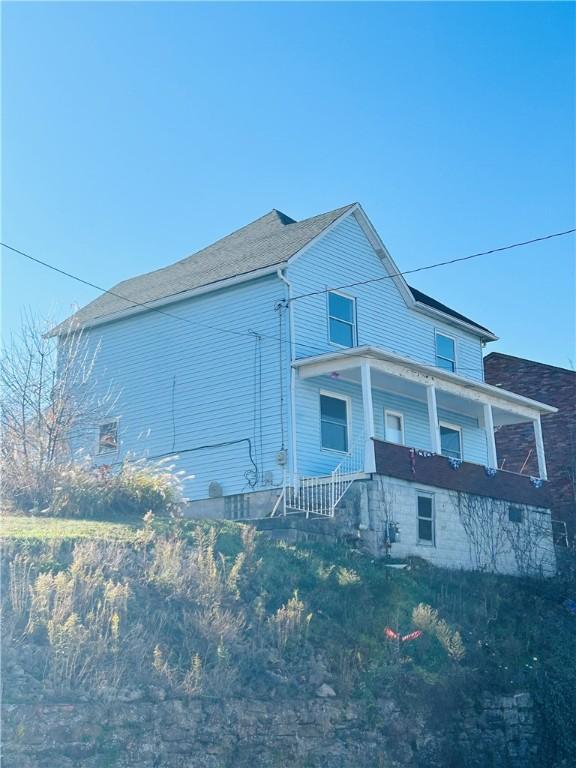 403 Lowell St, Vandergrift Wml, PA 15690 - view of property exterior with a porch