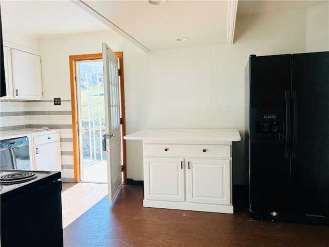 kitchen with dark hardwood / wood-style flooring, dishwasher, black fridge with ice dispenser, and white cabinets