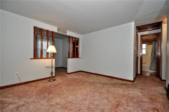 spare room featuring carpet flooring