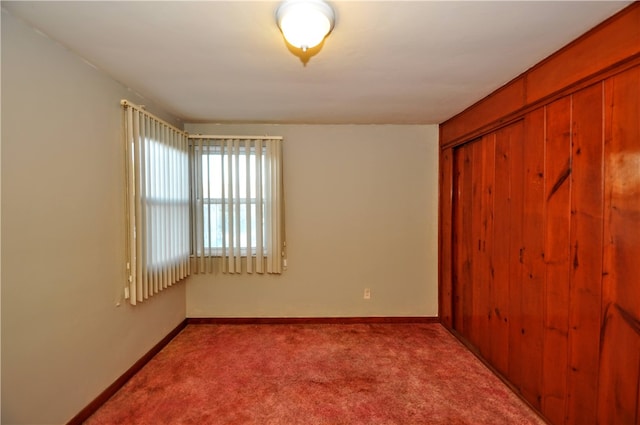 spare room with light colored carpet