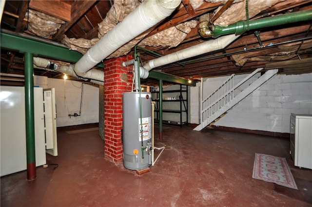 basement featuring washer / dryer and water heater