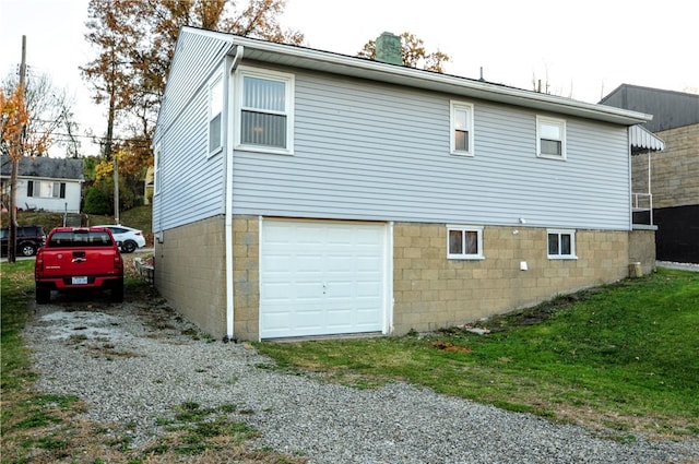 view of property exterior with a garage