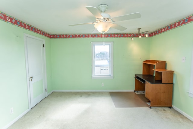 unfurnished office with light colored carpet and ceiling fan
