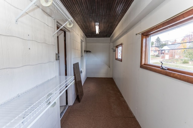hall featuring wood ceiling