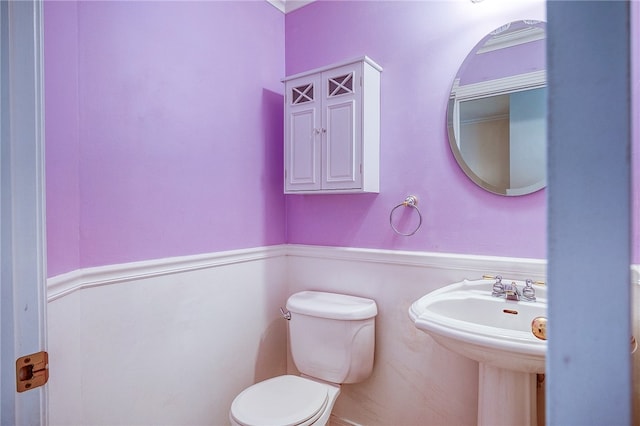 bathroom with toilet and sink