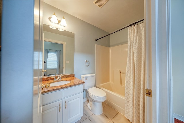 full bathroom with vanity, toilet, shower / bath combo with shower curtain, and tile patterned floors