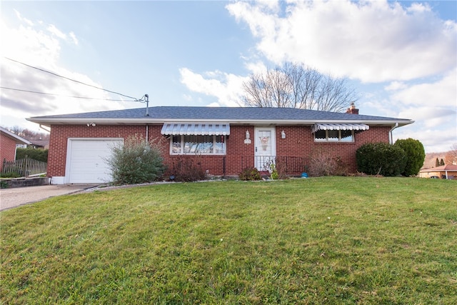 single story home with a garage and a front lawn