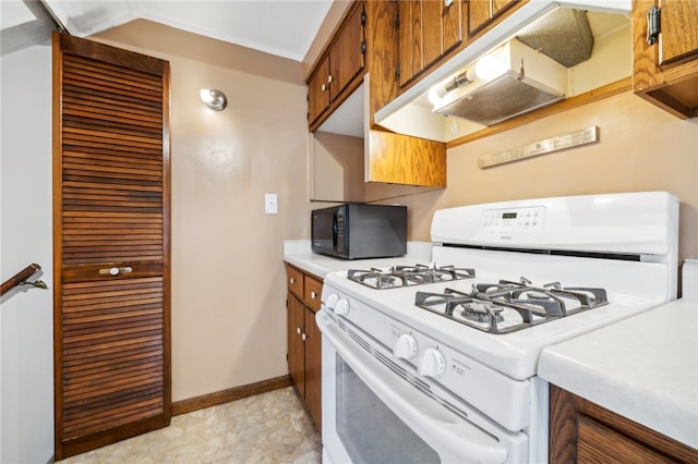 kitchen featuring white gas stove