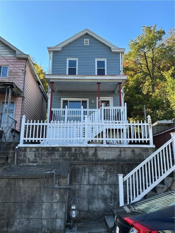 1447 Fleming Ave, Mckees Rocks, PA 15136 - view of front of home with covered porch and stairs