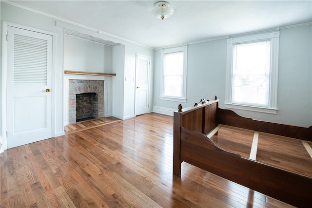 interior space with wood-type flooring and multiple windows