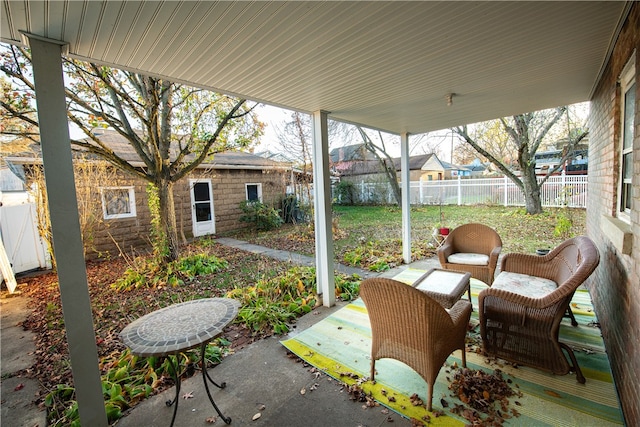 view of patio featuring an outdoor structure