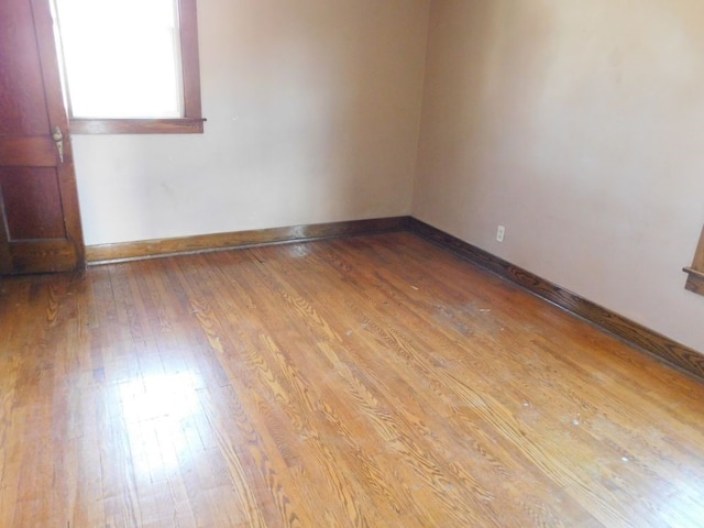 spare room with light wood-type flooring